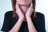 tonsils, sore throat, woman touching throat, adenoiditis, throat pain, 