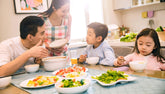 happy family eating salad