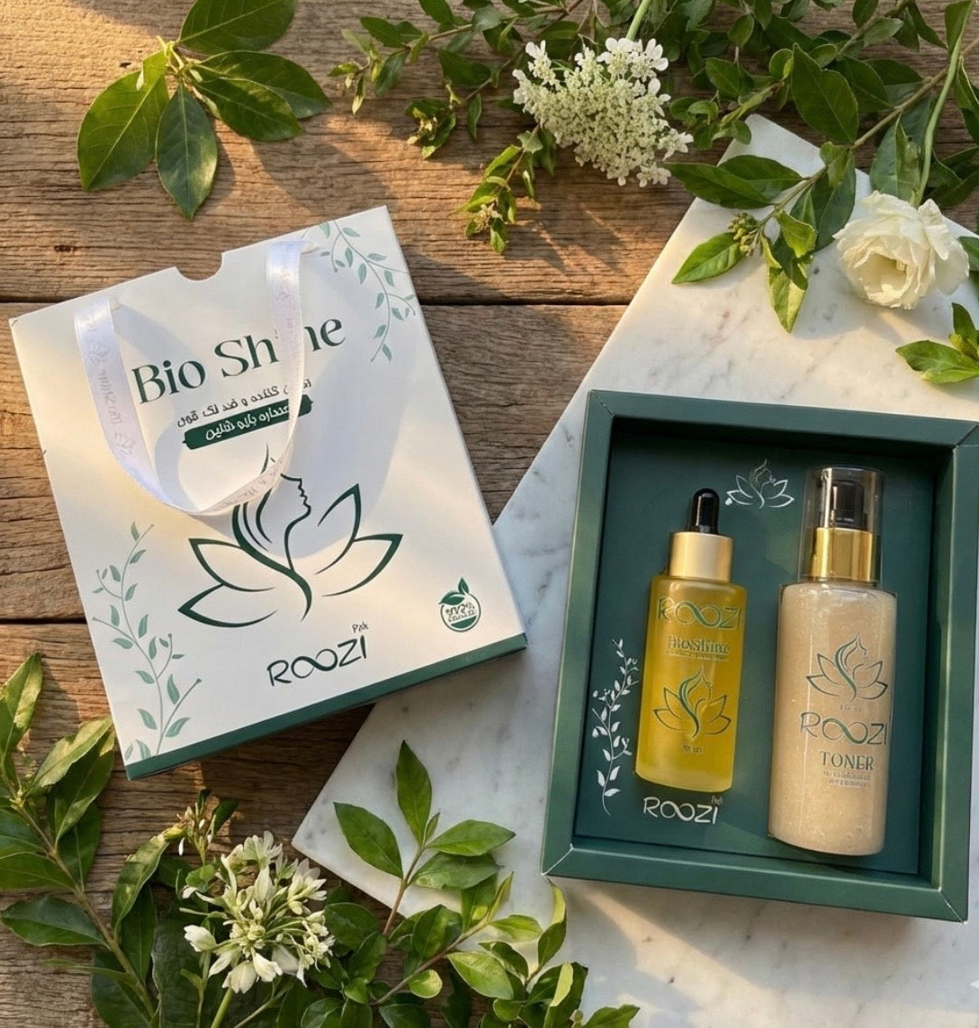 Roozi brand Bio Shine natural skincare set, including facial serum and toner in luxury green packaging and a branded carrier bag